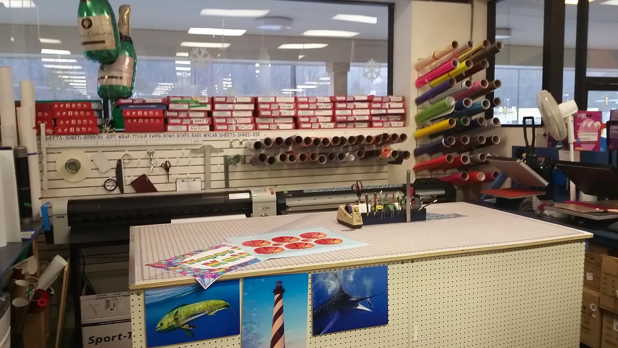 The CP Signs and Graphix print room with a wide-format printer